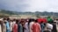 Mourners carry the coffin of an Afghan security member of a border post killed by Taliban fighters, during a funeral in Dande Patan district of Paktia Province on May 29.