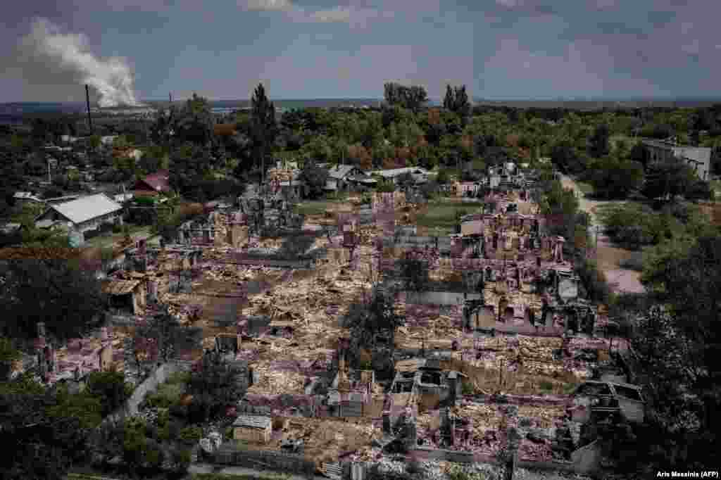 Руины домов через несколько месяцев после начала боев – снимок сделан в июне 2022 года. В это время российские войска объявили о том, что они оккупировали Приволье