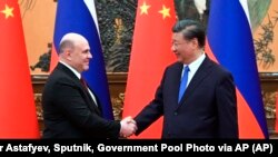 Ruski premijer Mihail Mišutsin na sastanku s kineskim predsednikom Si Đinpingom, Peking, 24. maj 2023.
