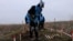 Mikolayiv, Ukraine -- A trainee of the NPA demining program at a clearance site in southern Ukraine 