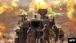 ისრაელის არმიის სამხედროები ქვეყნის სამხრეთიდან უტევენ ღაზის სექტორს. 2023 წლის 11 ოქტომბერი