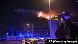 Пожар в "Крокус Сити Холле" после теракта