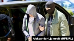 Privođenje policijskog inspektora Ilije Vasovića u Specijalno policijsko odjeljenje u Podgorici 6. juna