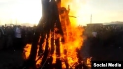People attend a protest on the Persian New Year holiday in western Iran on March 20. 