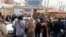 Families protest in Tehran on March 5.