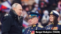 რუსეთის პრეზიდენტი ვლადიმირ პუტინი ლუჟნიკების სტადიონზე გამართულ კონცერტზე, 22 თებერვალი, 2023 წელი