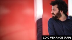 Iranski filmski režiser Saeed Roustayi pozira tokom portretne sesije na marginama 75. Kanskog filmskog festivala 2022.