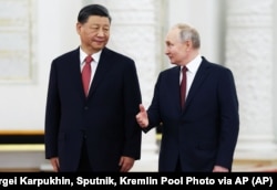 Глава Китая Си Цзиньпин и президент России Владимир Путин