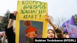 Protesting under the slogan “A woman's life is a mirror of society,” Kyrgyz demonstrators march in Bishkek on International Women's Day on March 8 to call for an end to violence against women and girls.