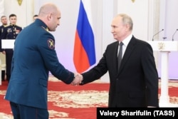 არტიომ ჟოგა და ვლადიმირ პუტინი. 2023 წ. 8 დეკემბერი