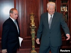 Boris Yeltsin (right), Russian president at the time, welcomes then-Prime Minister Vladimir Putin at the Kremlin in 1999.