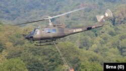 Helikopter Oružanih snaga BiH pomaže u gašenju požara u Nacionalnom parku "Sutjeska", Foča, 12. august 2024. godine