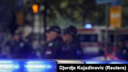 Serbia, Belgrade--Police secures the area after a boy opened fire on other students and staff at a school in downtown Belgrade, May 3, 2023