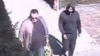 A still image taken from surveillance video allegedly showing Artyom Uss (right) escaping house arrest in Milan, Italy, on March 22, 2023. 