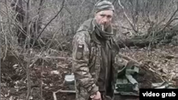The video appears to show an unidentified, detained Ukrainian soldier standing in a trench being shot dead with automatic weapons after saying, "Glory to Ukraine."