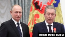 რუსეთის პრეზიდენტი და "ლუკოილის" აღმასრულებელი დირექტორი, რავილ მაგანოვი. 2019 წლის 11 ნოემბერი
