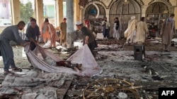 Последствия взрыва в шиитской мечети, Афганистан, провинция Кундуз, 8 октября 2021 года