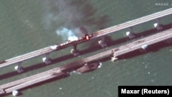 Взрыв и пожар на Крымском мосту со спутника, 8 октября 2022 года