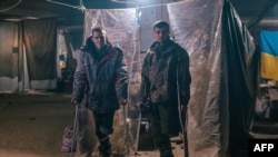 Ranjeni ukrajinski vojnici u poljskoj bolnici unutar bunkera čeličane Azovstal u Mariupolju, Ukrajina (fotografija objavljena 10. maja 2022.)