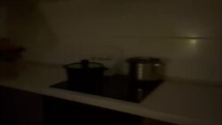 ტატიანა მილიმკო ანთებს გაზქურას