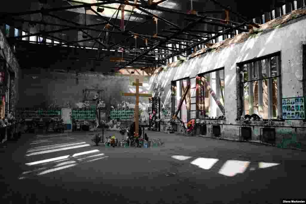 In recent days, locals have cleared away a year's worth of toys from the gym in School No. 1 to make way for a wave of new offerings that people will bring to mark the 10-year anniversary of the siege. The three-day commemoration will begin September 1 with a now-traditional funeral service at the old school, followed by a procession to the cemetery. The gym itself is encased in a golden sarcophagus that, with its floral pattern, signifies a huge wreath. On the second day, there will be a requiem concert in Vladikavkaz, the regional capital of North Ossetia. On Wednesday, September 3, mourners will hold two final funeral services, and release white balloons to represent each of the lives lost. 