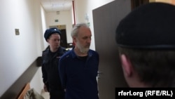 Иоанн Курмояров в суде