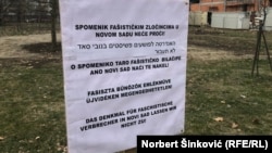 Antifašističke organizacije su organizovale proteste protiv podizanja ovog spomenika: Ova improvizovana tabla je postavljena na protestu 23. decembra 2021. godine.