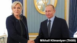 ლე პენი და ვლადიმირ პუტინი. მოსკოვი, 24 მარტი, 2017 წ.