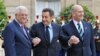 Palestinian President Abbas, French President Sarkozy, and Isreali Prime Minister Olmert (left to right) at Elysee Palace on July 13