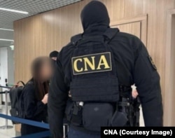 Poza făcută de CNA în momentul reținerii Evgheniei Guțul.