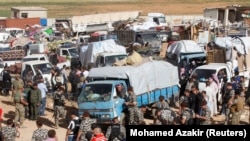 Сирийские беженцы возвращаются в страну из Ливана