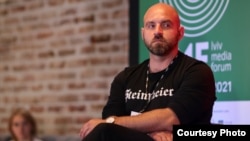 Павел Казарин