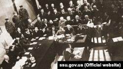 Судовий процес у сфабрикованій справі так званої «Спілки визволення України». Мета – дискредитація провідних діячів української культури та громадського життя в Україні. Харків, 1930 рік