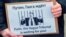Плакат «Путин, Гаагский трибунал ждет тебя!» на акции против агрессии России по отношению к Украине. Амстердам, 6 марта 2022 года