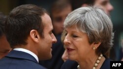 Эммануэль Макрон и Тереза Мэй на саммите в Брюсселе, 22 июня 2017