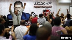 Pristalice Muhameda Morsija slave pobedu u sedištu Muslimanskog bratstva