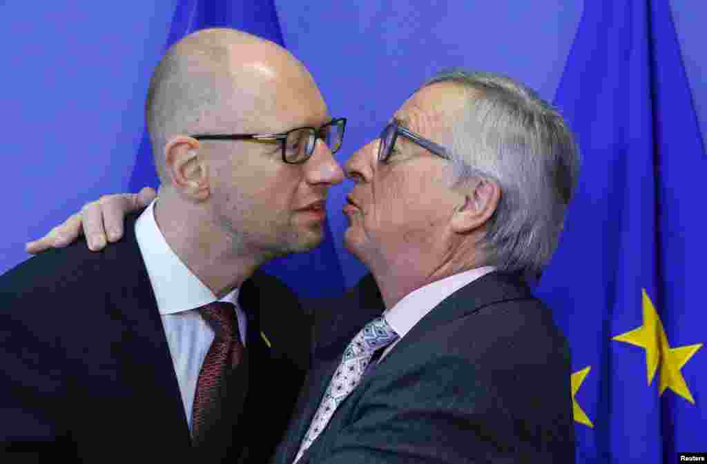 Премьер-министр Украины Арсений Яценюк и глава Еврокомиссии Жан-Клод Юнкер. Брюссель, 7 декабря 2015 года.  