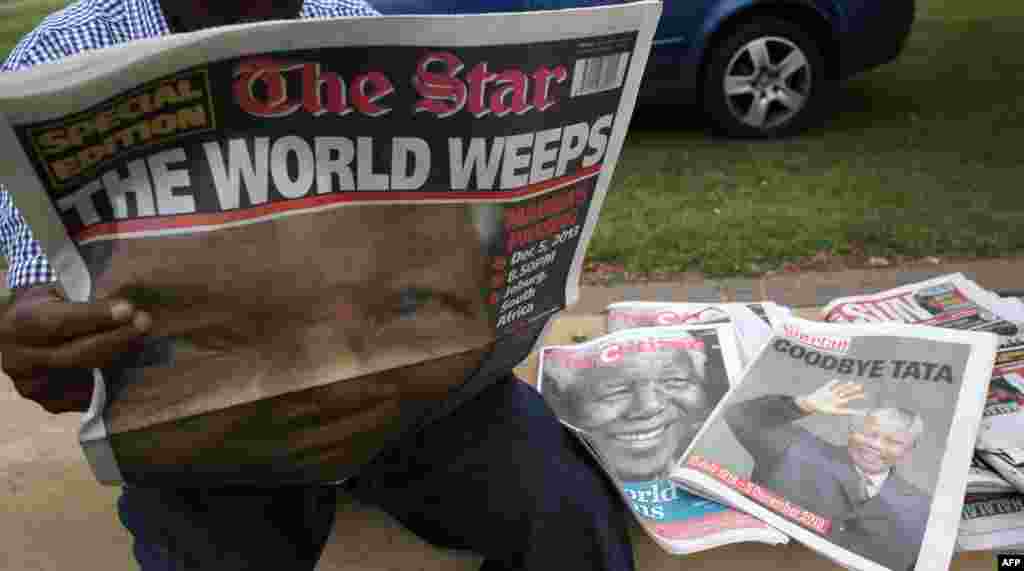 Soweto, 6. decembar 2013. Foto: AFP / Alexander Joe