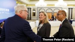 Sergei Ryabkov, Andrea Thompson i Robert Wood