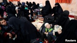 Žene i djeca u Rakki, Sirija, oktobar 2017.