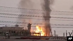 A frame grab from Iranian TV shows fire at the South Pars gas field following an Israeli drone strike.