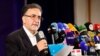 Iranian reformist politician Mostafa Tajzadeh addresses the media in May 2021.