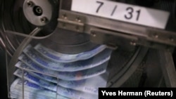 Mašina za brojanje novca. 