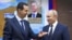 SYRIA – Syrian President Bashar Assad, left, gestures while speaking to Russian President Vladimir Putin during their meeting in Damascus, Syria, Jan. 7, 2020