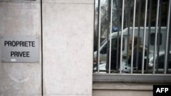 Prozor redakcije Charlie Hebdo, 7. januar 2014.