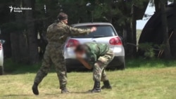 Iza rampe zatvorenog paramilitarnog kampa na Zlatiboru Iza rampe zatvorenog paramilitarnog kampa na Zlatiboru