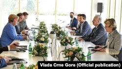 Zdravko Krivokapić, premijer Crne Gore, prilikom susreta sa Angelom Merkel, njemačkom kancelarkom, u Tirani 14. septembra 2021.