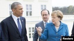 Президент США Барак Обама (л), президент Франції Франсуа Олланд та канцлер Німеччини Анґела Меркель (п), ілюстративне фото