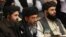 Mullah Baradar (left), the Taliban's deputy leader and chief negotiator, at an international peace conference in Moscow on March 18