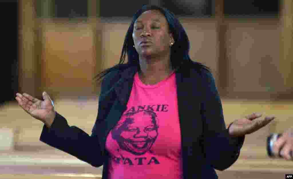 Soweto, 6. decembar 2013. Foto: AFP / Alexander Joe